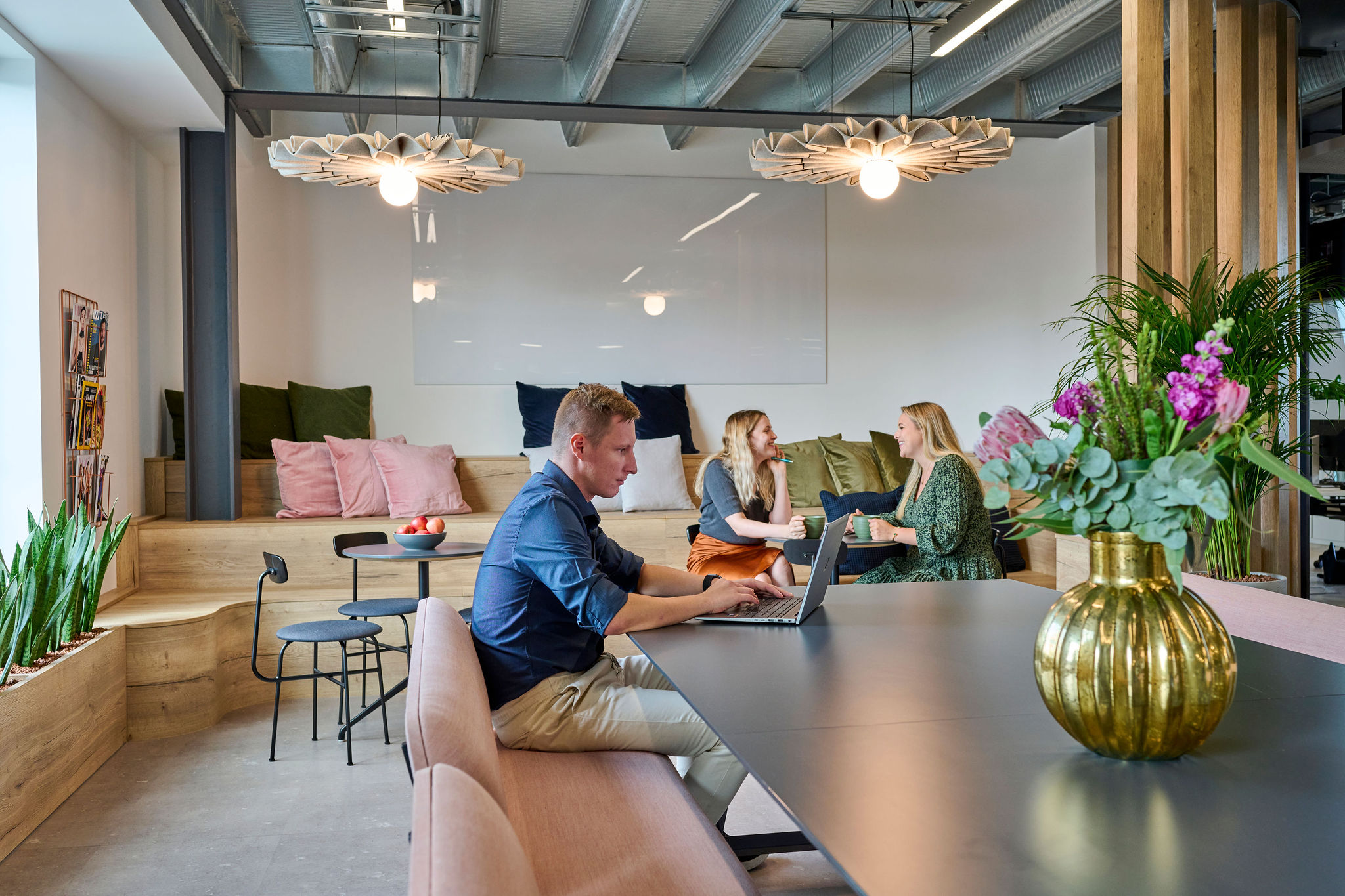 Photo of people working in an office.