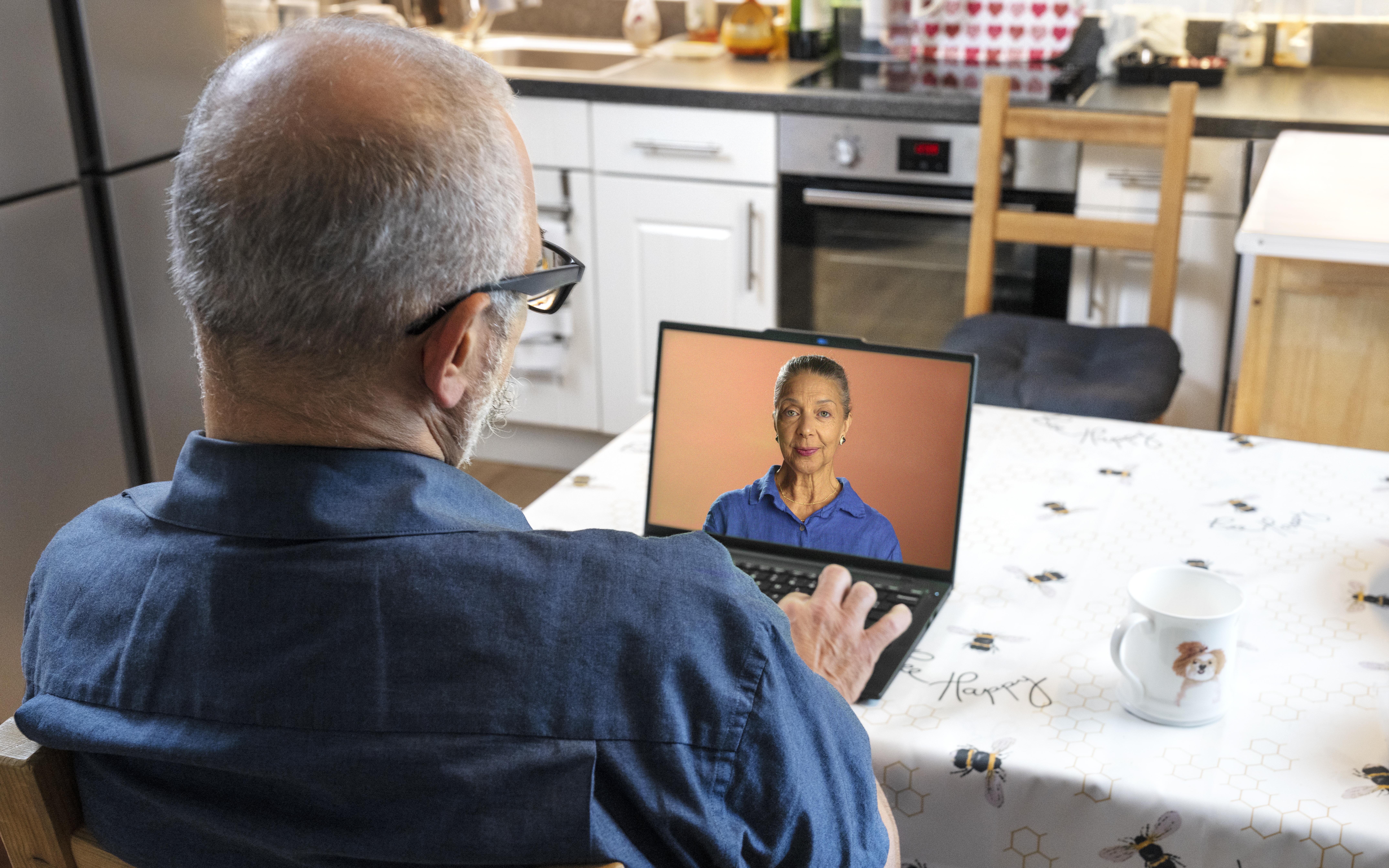 Man looking at his laptop screen